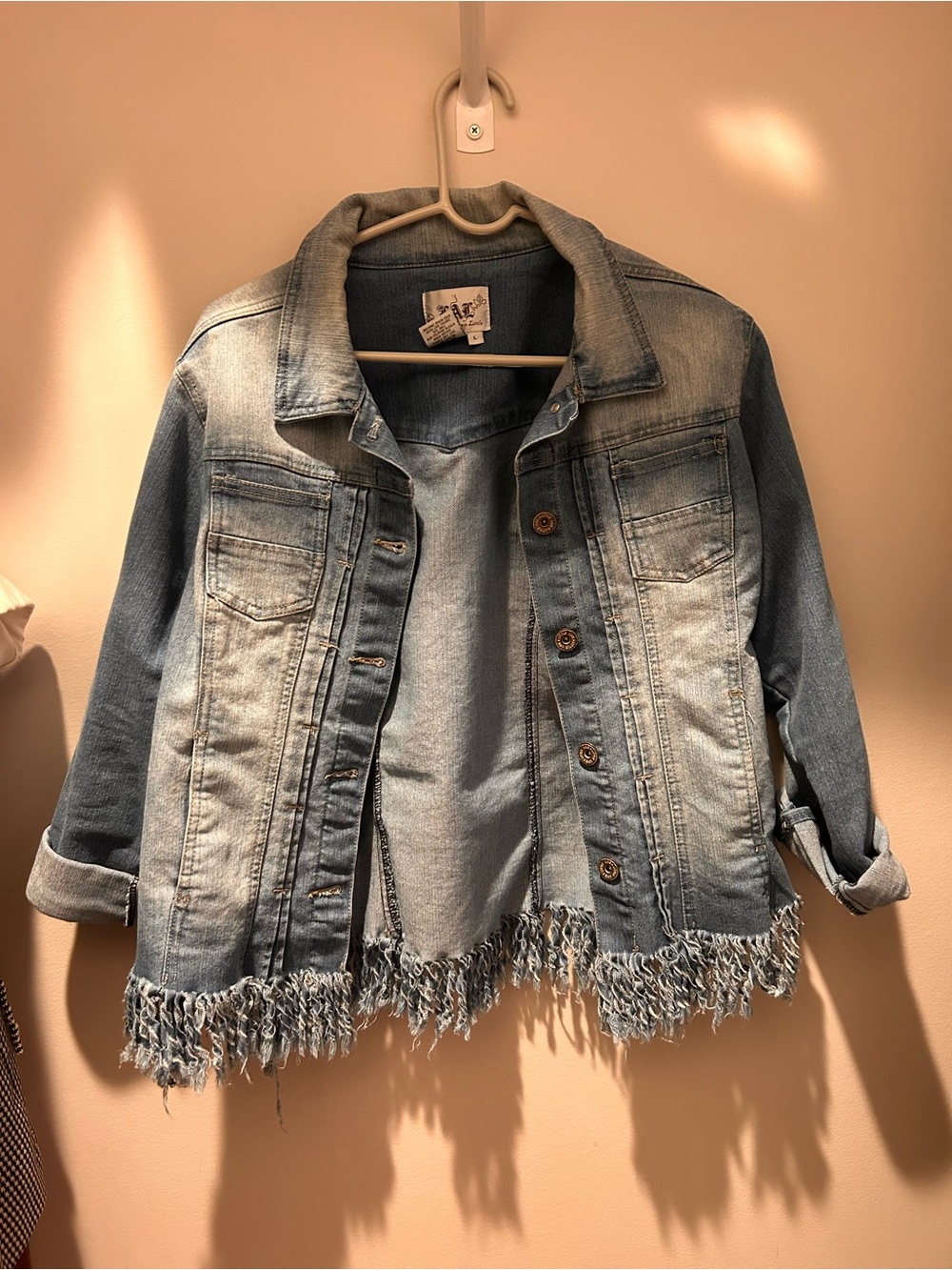 Women’s Light Blue Distressed Denim Jacket with Frayed Hem